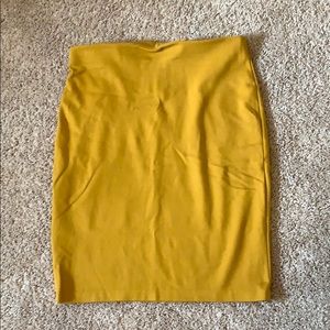 Mustard pencil skirt with exposed zipper